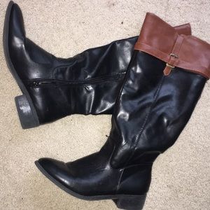 Leather black and brown boots.